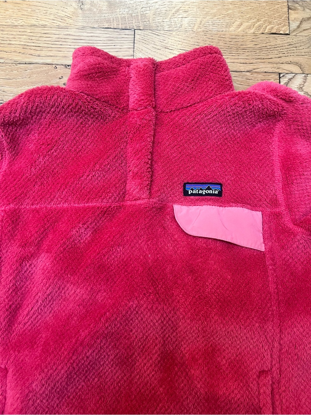 Patagonia women’s Re-Tool Bright Pink Fleece Pullover